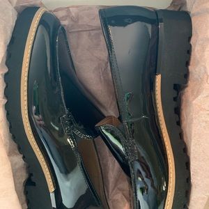 Brand new never worn patent leather black flat loafers